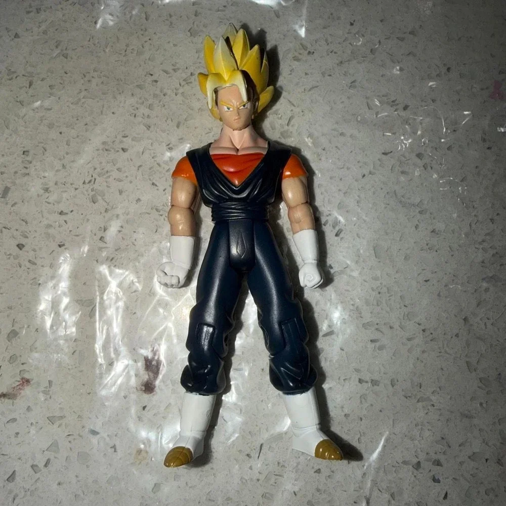 Dragon Ball Z lot of 8 action figures with orange jumpsuit, blue boots and belt